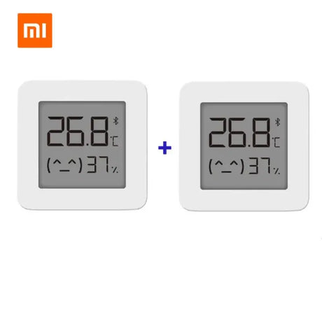 Two white square clocks with different times displayed on them