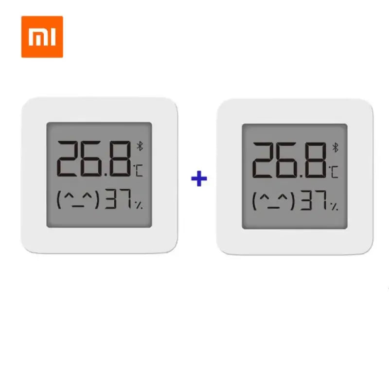 two white square clocks with different times displayed on them