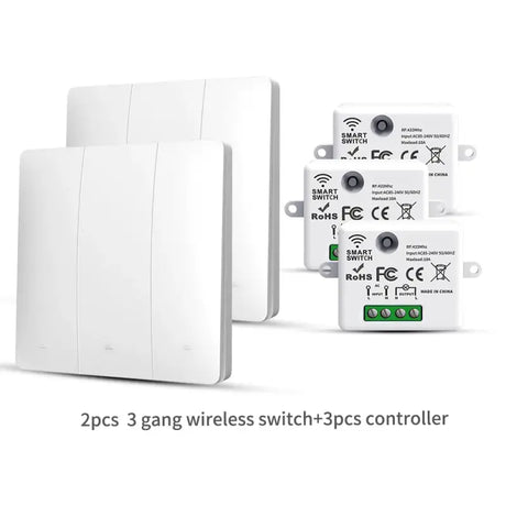 Two white switches and a remote control unit on a white background