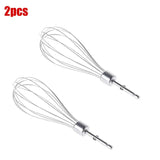 two wire whisks are shown on a white background