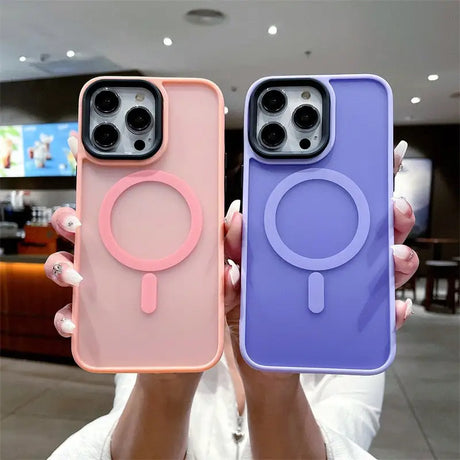 two women holding up their iphone cases