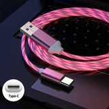 a usb cable with a pink glow on it