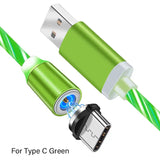 a green cable with a white and black connector