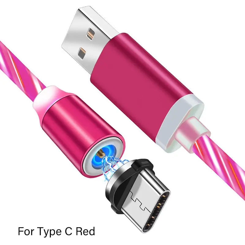 a close up of a pink cable connected to a usb cable