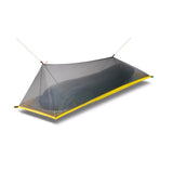 a close up of a tent with a yellow strip on it