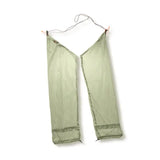 a green pants hanging on a hanger