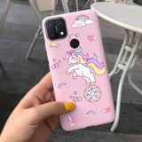a girl holding a pink phone case with a unicorn on it