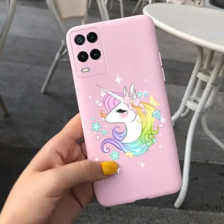 a pink phone case with a unicorn on it