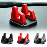 a close up of a car dashboard with four red and black car accessories