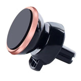 a black car phone holder with a rose gold metal knob