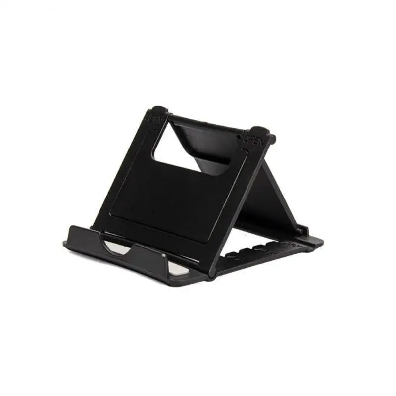 a black tablet stand with a laptop on top of it