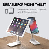 the ipad and ipad stand with a tablet on top