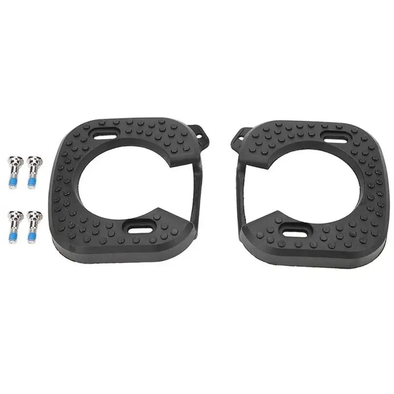 pair of black plastic pedals for harley