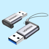 USB adapters or dongles with the brand name UGREEN visible.