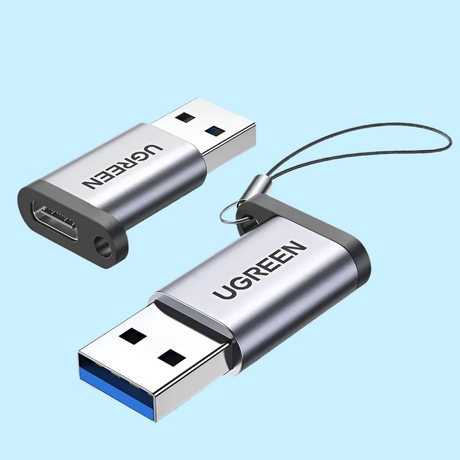 USB adapters or dongles with the brand name UGREEN visible.