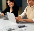 USB hub connected to multiple devices on a desk.