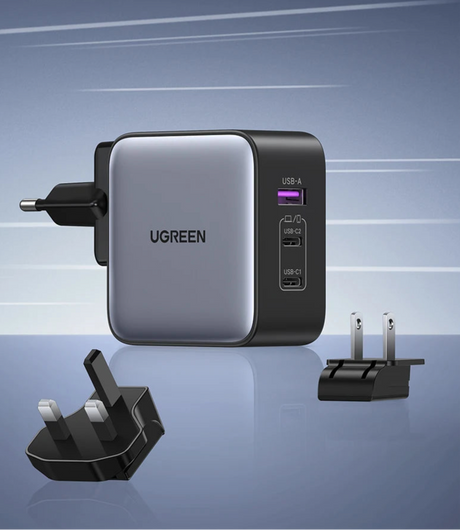 USB wall charger with multiple ports and interchangeable plug adapters.