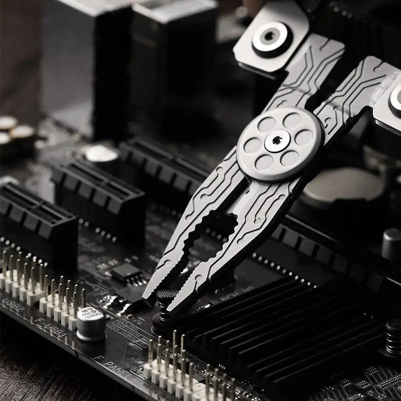 a close up of a motherboard with a small metal tool