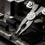 a close up of a motherboard with a small metal tool