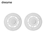 a pair of white plastic buttons with a white background