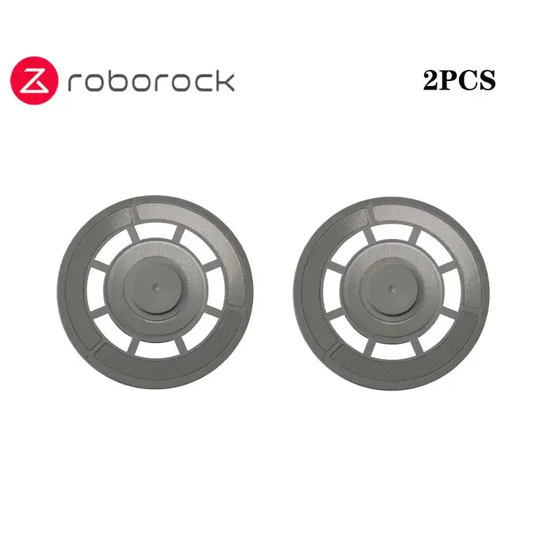 two gray circular plastic buttons with a white background