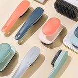 a collection of hair brushes and combs