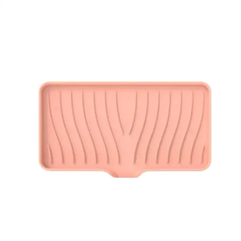 a pink silicon silicon silicon silicon tray with wavy lines