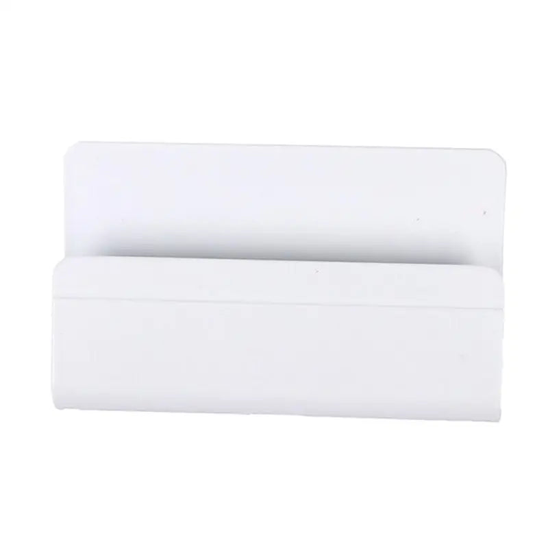 a close up of a white plastic mail holder on a white background