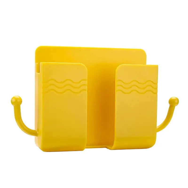 a yellow book holder with two books on it