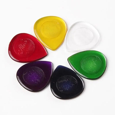 a set of four glass buttons with a circular design