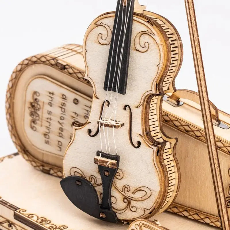 a violin on top of a book