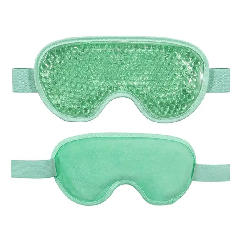 a pair of green eye masks