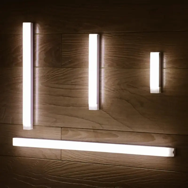 A wall light with three lights on it