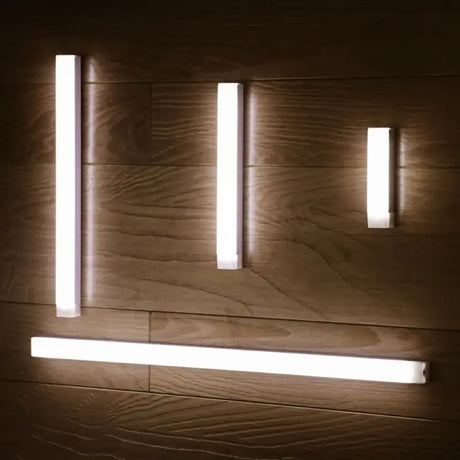 a wall light with three lights on it