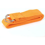 a pair of orange knitted cloths with a metal ring