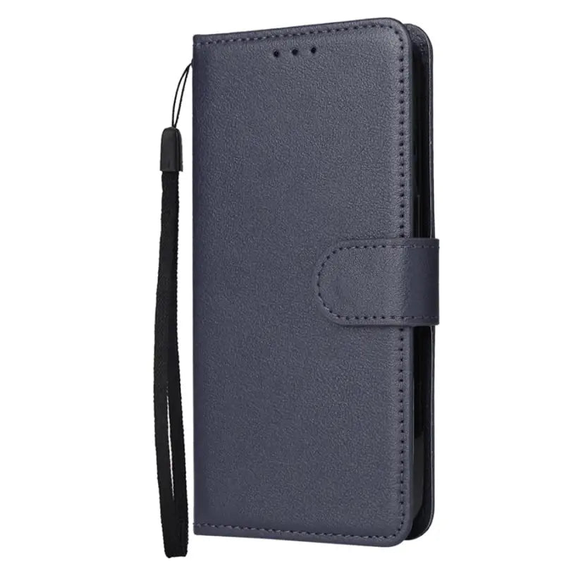 the back of a blue leather wallet case with a black strap