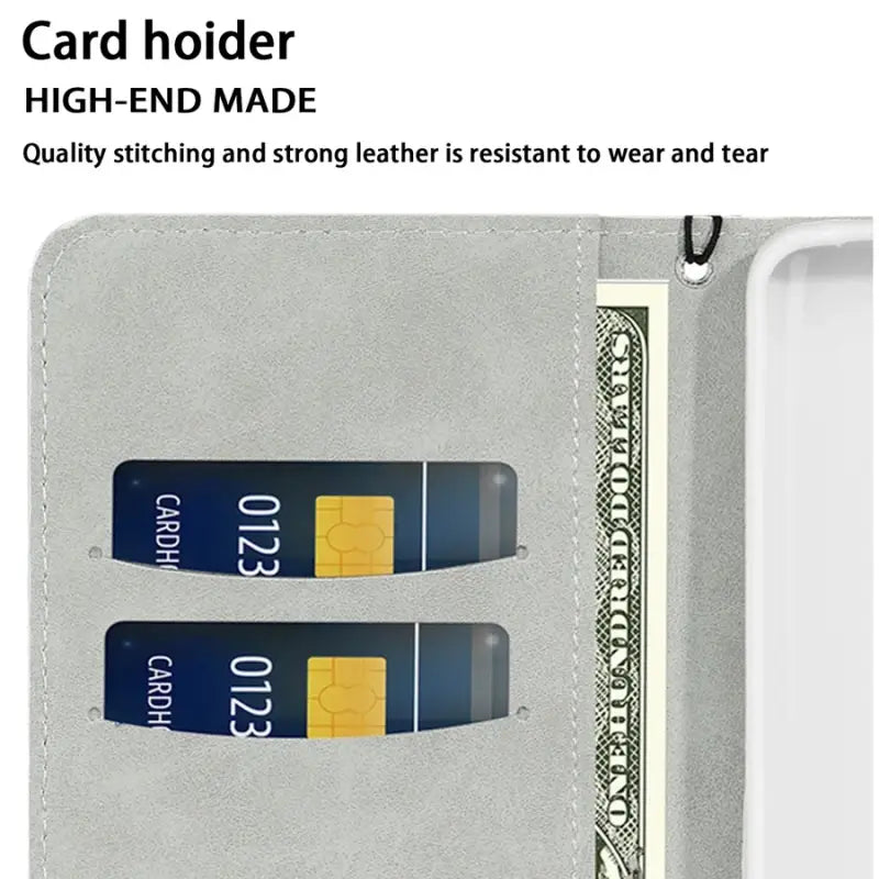 A wallet with two credit cards attached to it