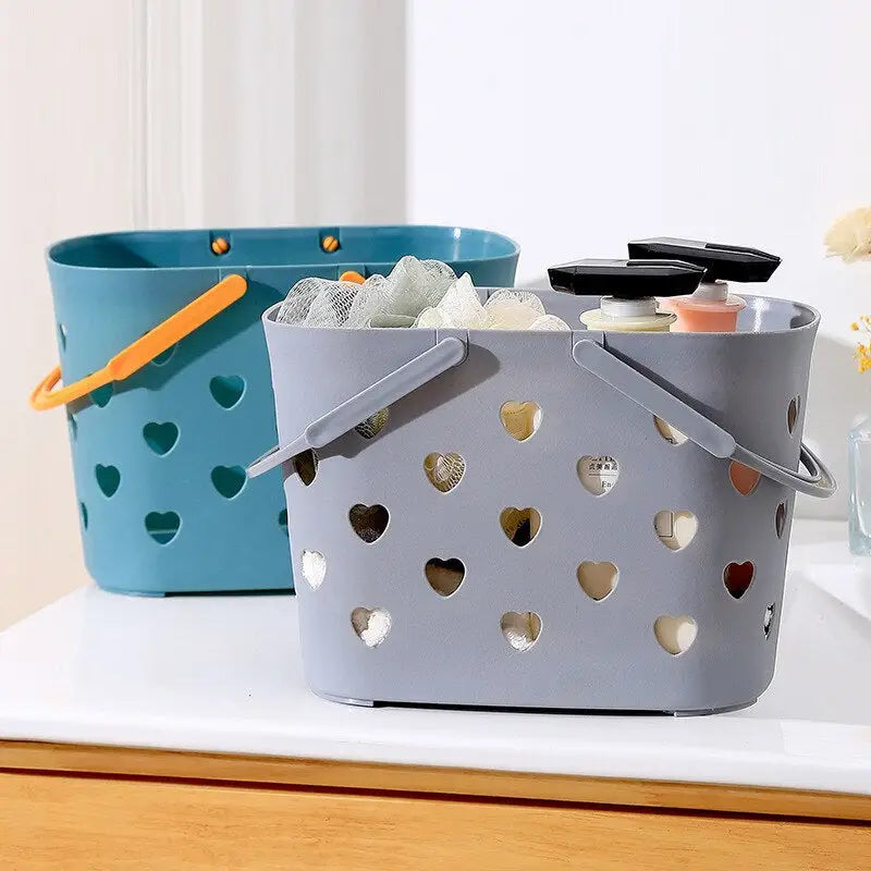 three grey and blue plastic storage baskets with hearts