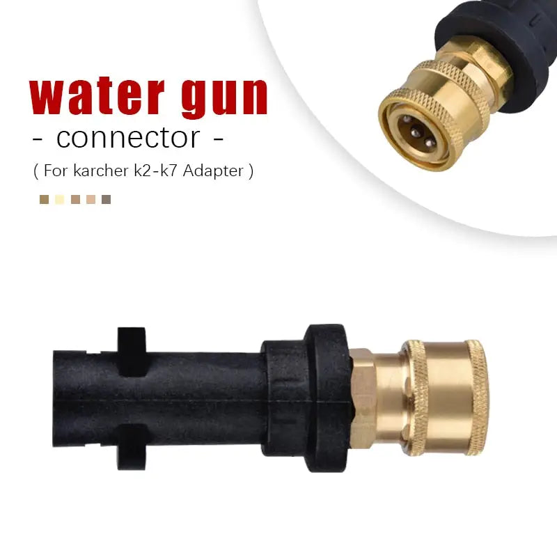 a close up of a water gun connector with a black hose