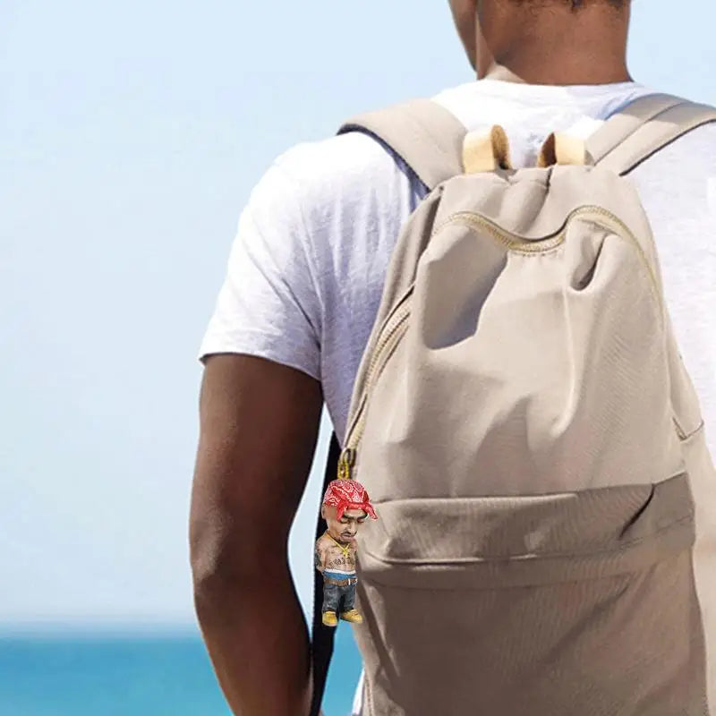 a man with a backpack looking out at the ocean