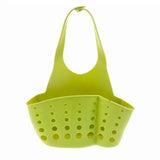 a close up of a green plastic basket with holes on it