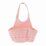 a pink plastic shopping basket with holes