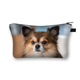 a small pouch bag with a small dog’s face