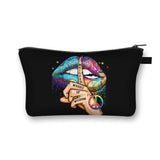 a black zipper bag with a colorful lip and a peace sign