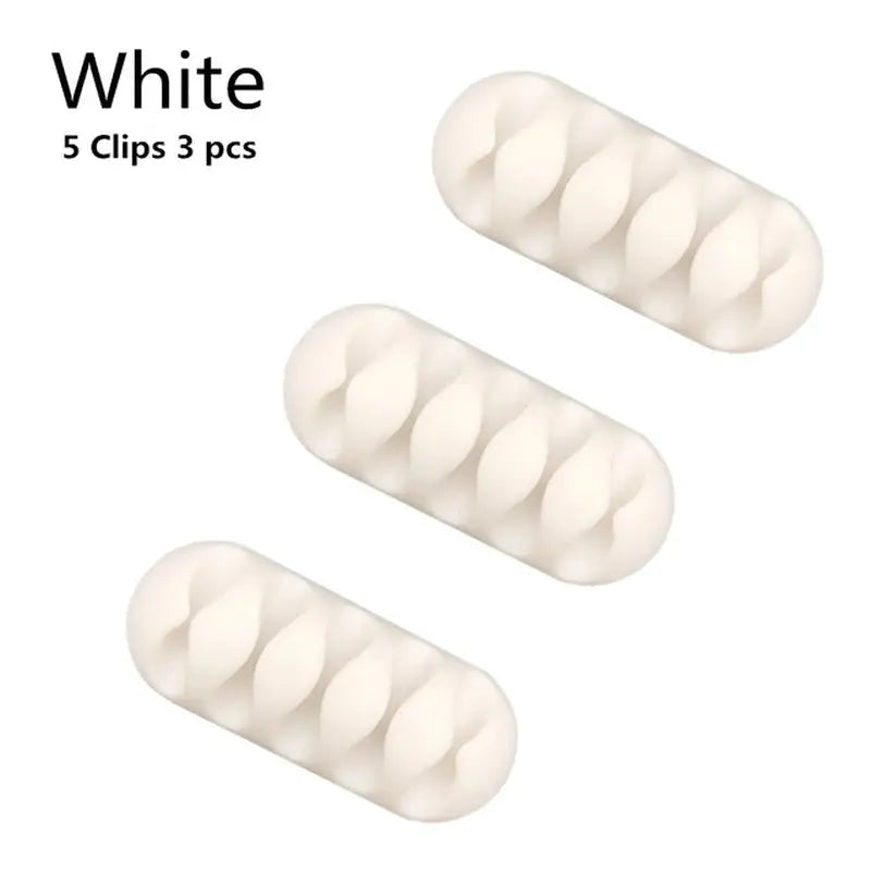 three white pills are arranged in a row on a white background