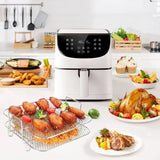 a white air fryer with a basket of food