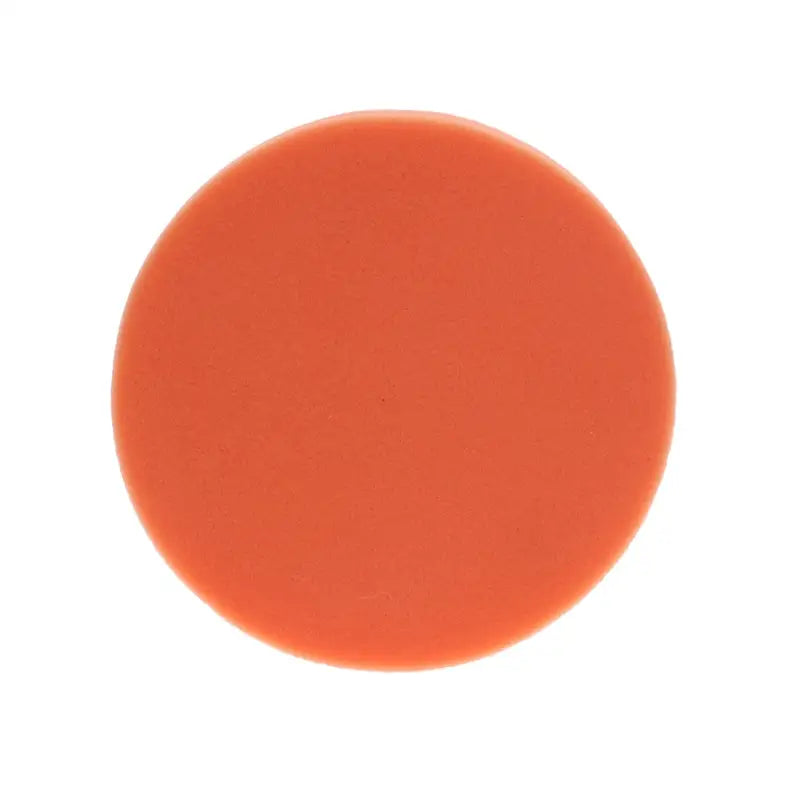 a round orange liquid on a white background