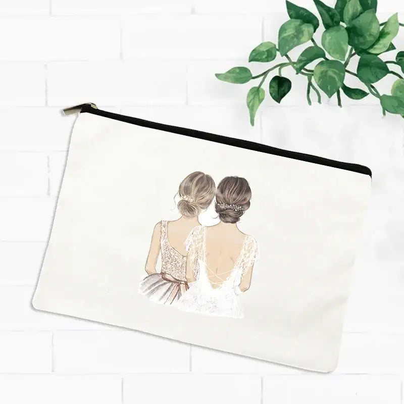 a white bag with a drawing of a bride and her maid