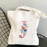 a white bag with a flower on it