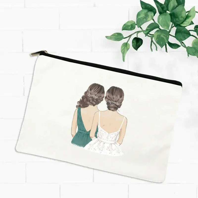 a white bag with a drawing of two women sitting on the ground